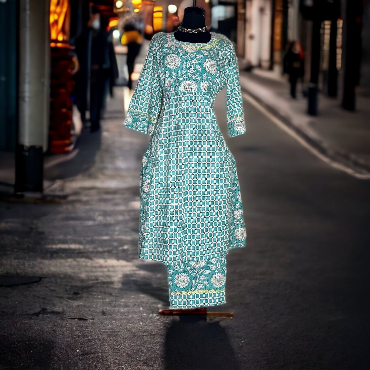 Blue pure cotton printed kurta set finished with tie and dyed cotton lacing