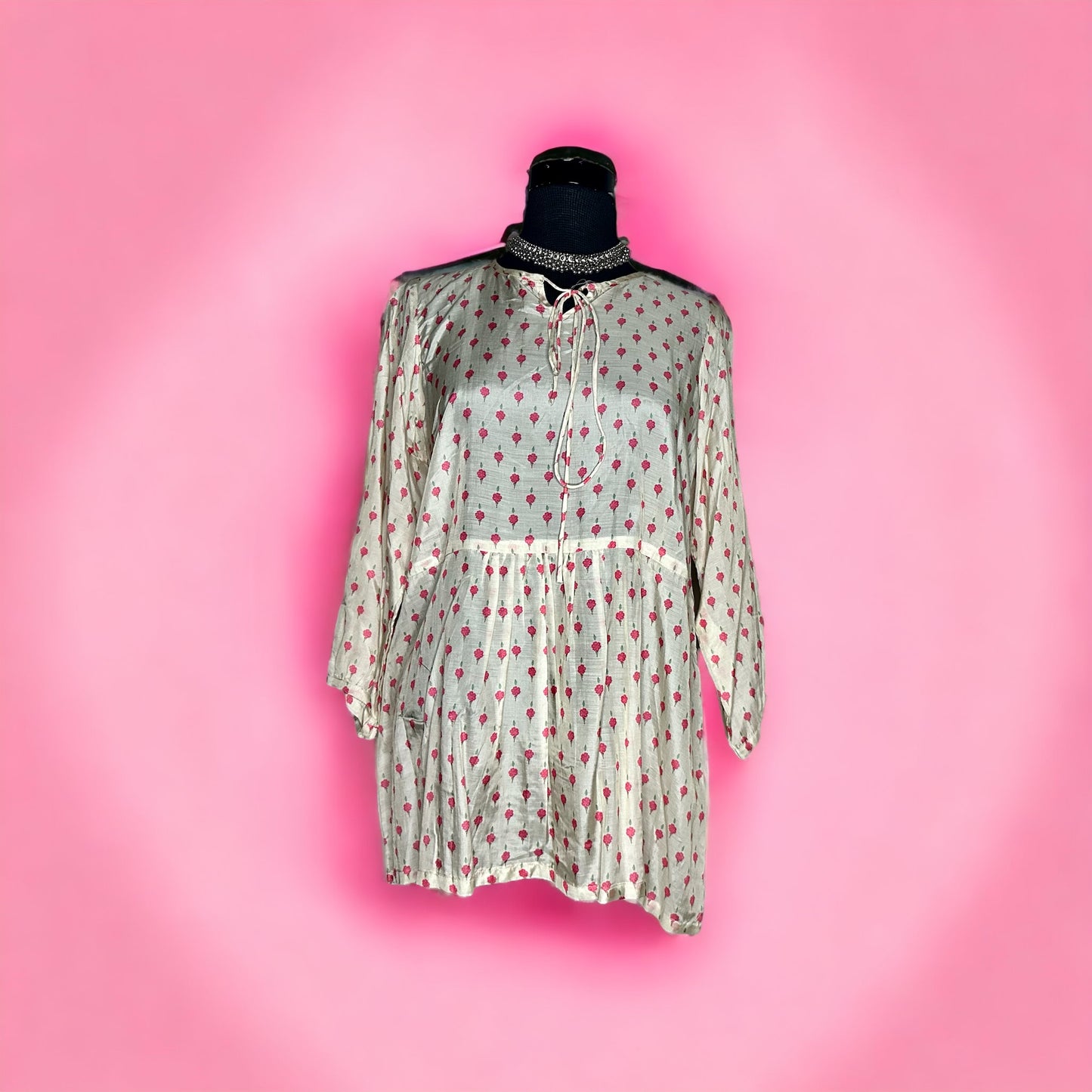 Beautiful beige printed peplum Stitched top